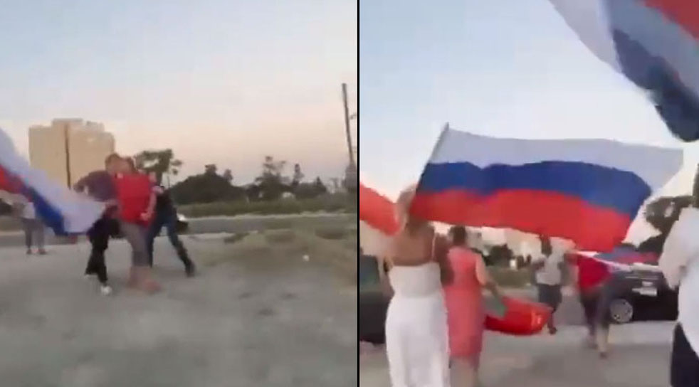 Турция против русских. Украинка напала на русскую на Кипре. Кипр против Турции. Флаги на демонстрации.