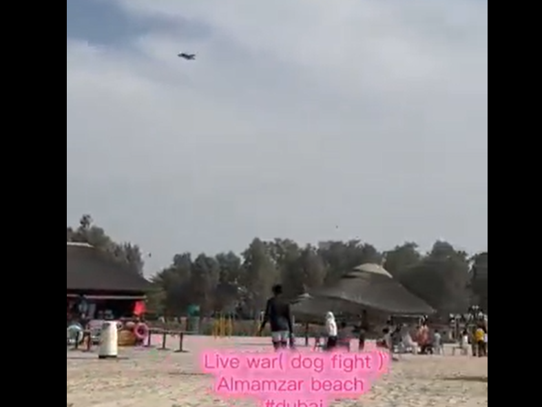 Bathing on the Beach as F-16 Intercepts Iranian Shahed Above Them